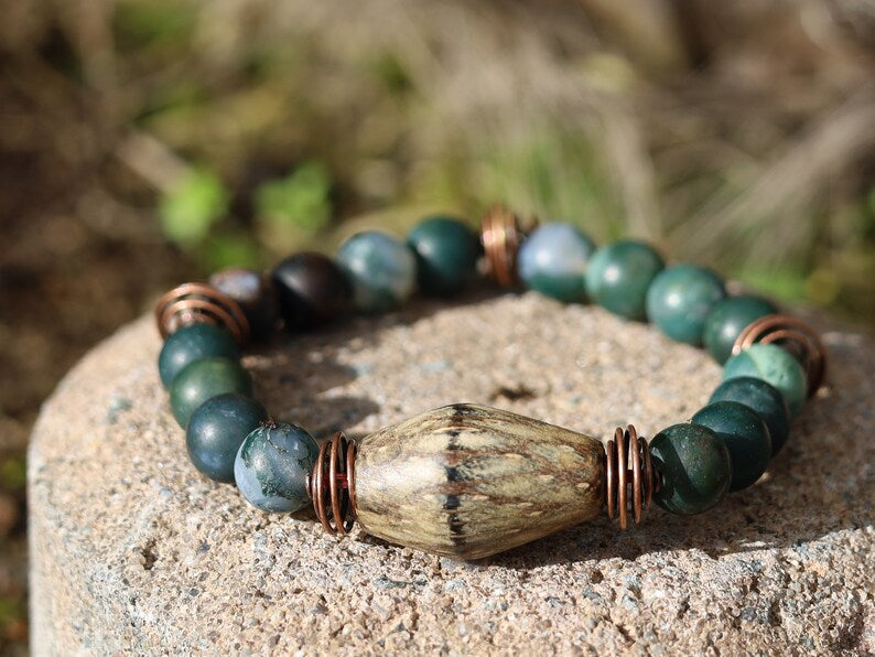 Palmwood bicone brown bracelet with Moss Agate stones and spiral round copper-coloured. self-esteem, mood swings, and inner calm.