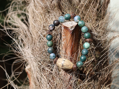 Palmwood bicone brown bracelet with Moss Agate stones and spiral round copper-coloured. self-esteem, mood swings, and inner calm.