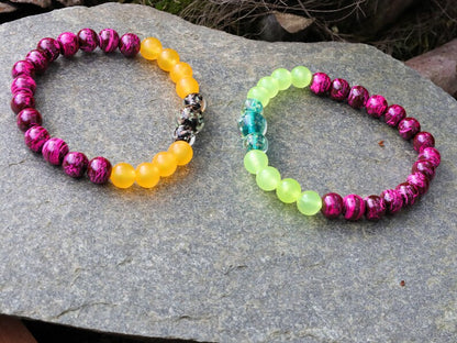 Glow in the dark - 2x bracelets glow in the orange/ green beads combined with amazing handcrafted glow in the dark lampwork beads.