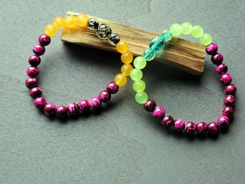 Glow in the dark - 2x bracelets glow in the orange/ green beads combined with amazing handcrafted glow in the dark lampwork beads.