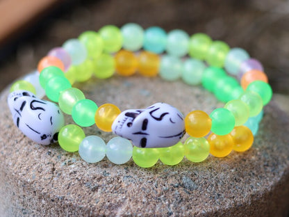 Bracelet 1 &2 - Luminous Acrylic Beads, different glow in the dark colors combined with UV Reactive Skull Beads.