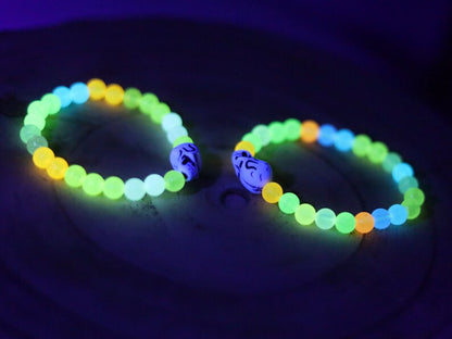 Bracelet 1 &2 - Luminous Acrylic Beads, different glow in the dark colors combined with UV Reactive Skull Beads.