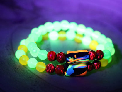 Glow in the dark - 2x bracelets mixed colored beads combined with clay Blacklight beads and ink purple color beads.