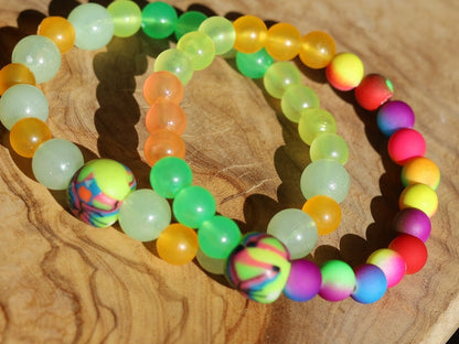 Glow in the dark - 2x bracelets UV Reactive Fluorescent Beaded Bracelets with glow in the dark. Combined with clay Blacklight beads.