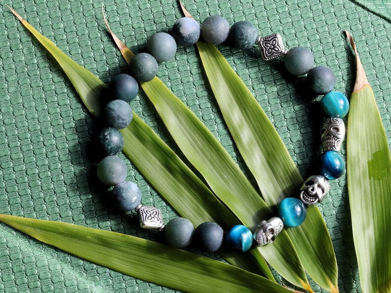 Trio faces bracelet Moss Agate stones and amazing 3x spacer tribal heads. seeking forgiveness, or finding love!