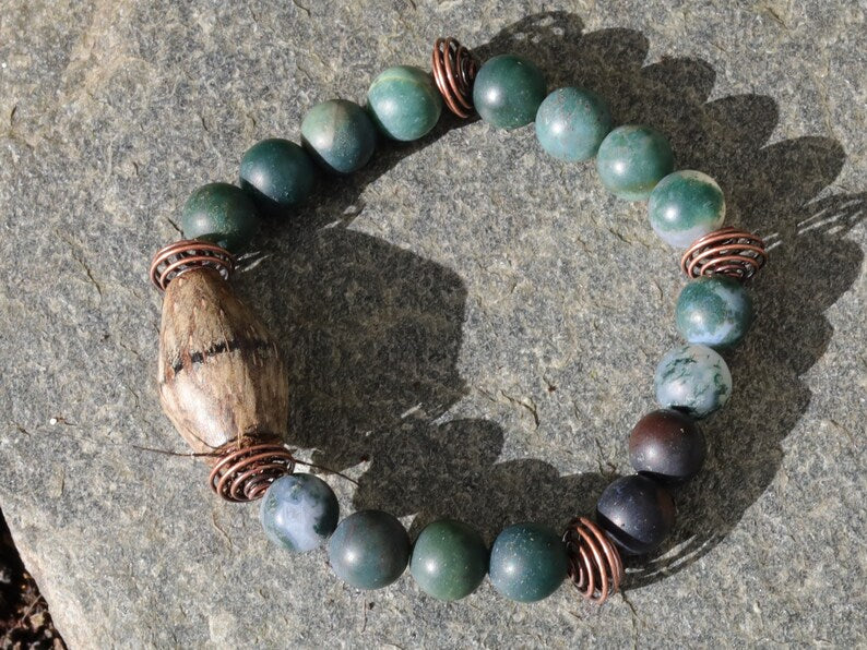 Palmwood bicone brown bracelet with Moss Agate stones and spiral round copper-coloured. self-esteem, mood swings, and inner calm.