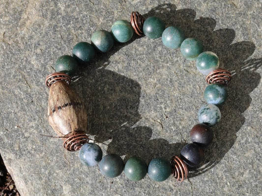 Palmwood bicone brown bracelet with Moss Agate stones and spiral round copper-coloured. self-esteem, mood swings, and inner calm.