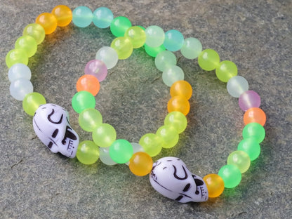 Bracelet 1 &2 - Luminous Acrylic Beads, different glow in the dark colors combined with UV Reactive Skull Beads.