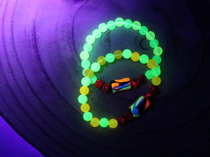 Glow in the dark - 2x bracelets mixed colored beads combined with clay Blacklight beads and ink purple color beads.