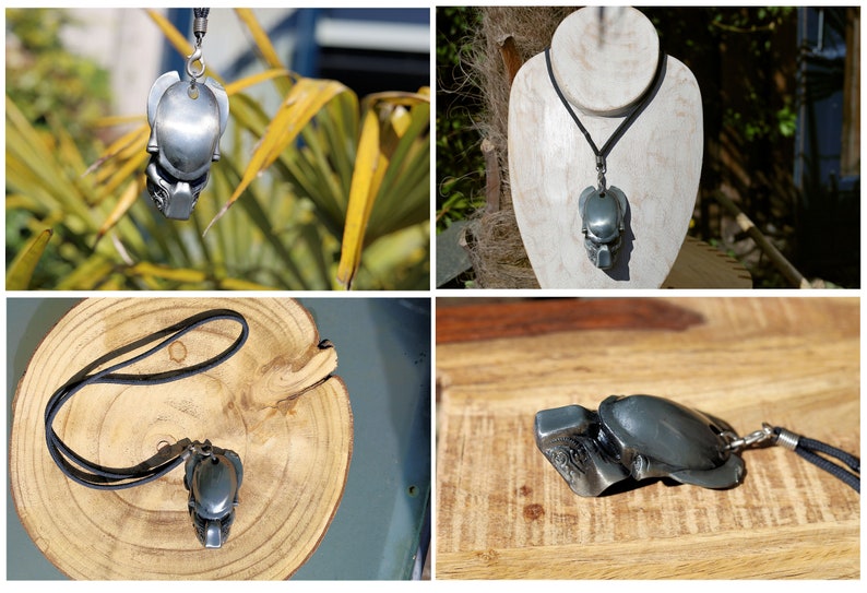 Aliens V Predator pendant. Pendant Size: 6.5x4.8cm (1cm=0.394in). weight: 35g. Metals : Zinc alloy. silver color. Rope chain 68 cm, not adjustable, diameter 3 mm