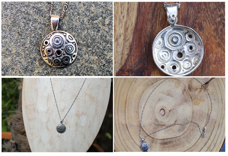 Sterling silver pendant. Stamped 925. Approximate weight 3.3 grams. Diameter 1.9cm (0.76 inches).