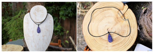PFancy sparkle necklace with dreamlike pendant, Bohemian glass stones.The pendant in drop form is black enamelled