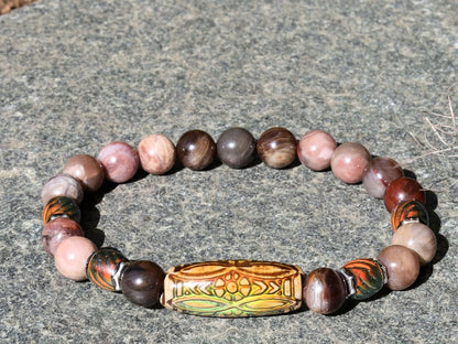 Color-changing Mirāja collection. Natural Petrified Wood Stone Beaded bracelet with Mood Daisy Ray Bead, Sensing Color Changing barrel beads