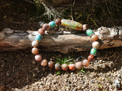 Color-changing Mirāja collection. Natural Petrified Wood Stone Beaded bracelet with Mood Daisy Ray Bead, Sensing Color Changing barrel beads