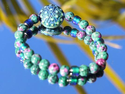Color-changing Mirāja collection. Colorful Persian Jade bracelet with Mirage Mood Stargazer Coin Bead. unique colors in every environment