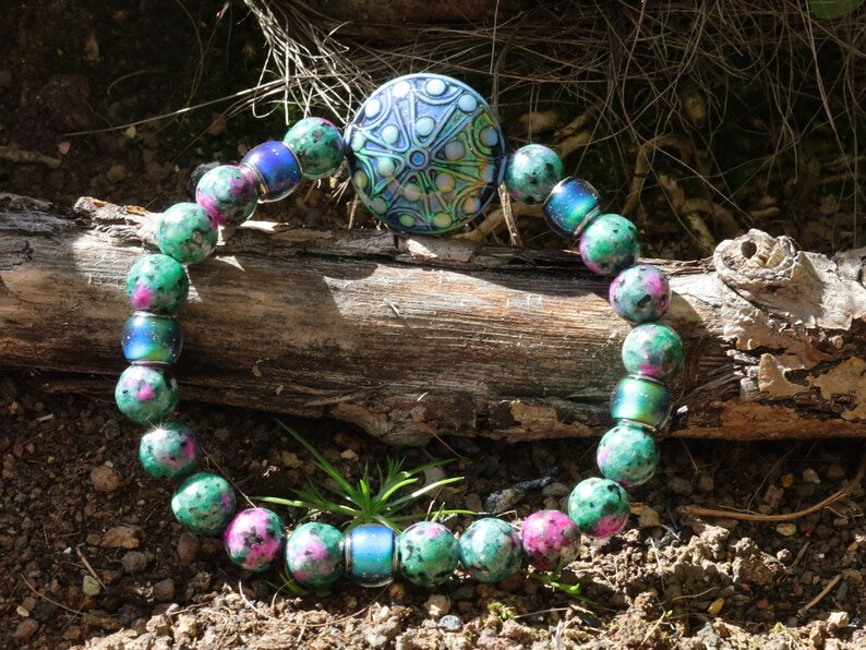 Color-changing Mirāja collection. Colorful Persian Jade bracelet with Mirage Mood Stargazer Coin Bead. unique colors in every environment