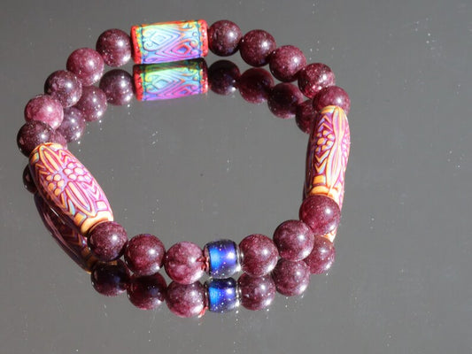 Color-changing Mirāja collection. Dark Red Garnet Jade Beads with Mirage Mood Daisy Ray. making it a popular choice for spiritual practices