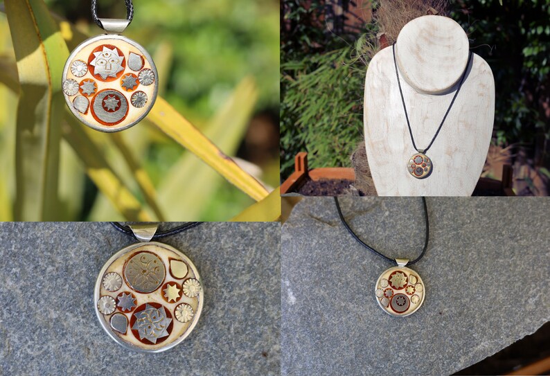 Old necklace pendant from Tibet with astronomy symbols. diameter 37 mm.