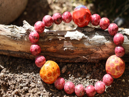 Unique Gorgeous Aggie Maroon Jade Beads bracelet with 16 mm red/ orange beads. Meaningful & symbolic merchandise. Durable stretchy cord