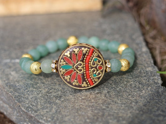 Beautiful combination. Frosted Round Natural Green Aventurine Beads bracelet combined with Gold Carved Brass Metal Loose Beads.