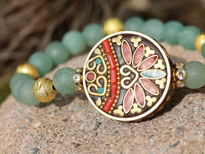 Beautiful combination. Frosted Round Natural Green Aventurine Beads bracelet combined with Gold Carved Brass Metal Loose Beads.