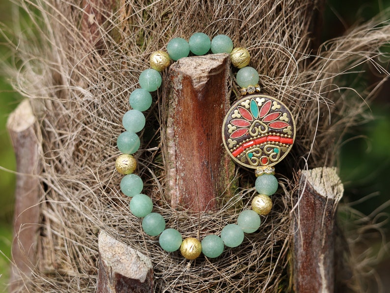 Beautiful combination. Frosted Round Natural Green Aventurine Beads bracelet combined with Gold Carved Brass Metal Loose Beads.