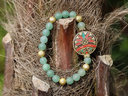 Beautiful combination. Frosted Round Natural Green Aventurine Beads bracelet combined with Gold Carved Brass Metal Loose Beads.