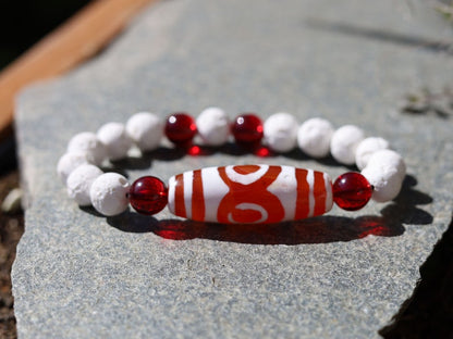 Energy Tibetan Red Agate 3 Eye Big Wisdom bracelet with  white lava beads  and 4x Red Agate beads. Surrounded by myth and mystery