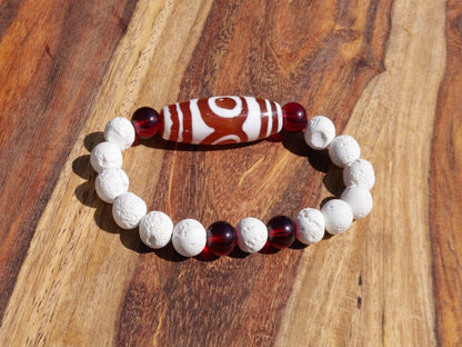 Energy Tibetan Red Agate 3 Eye Big Wisdom bracelet with  white lava beads  and 4x Red Agate beads. Surrounded by myth and mystery