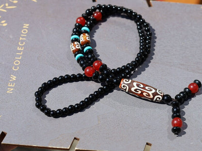 Tibetan Curved Ruyi Pattern Dzi Beads necklace. Amulet for Happiness and Increases Access to Good Luck.  protective and healing properties