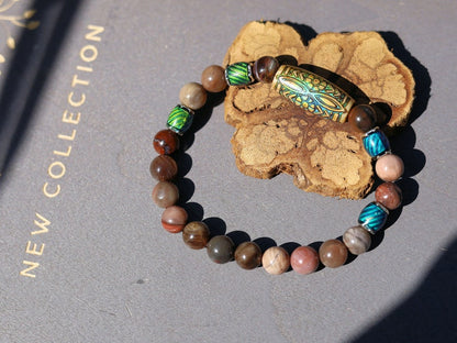 Color-changing Mirāja collection. Natural Petrified Wood Stone Beaded bracelet with Mood Daisy Ray Bead, Sensing Color Changing barrel beads