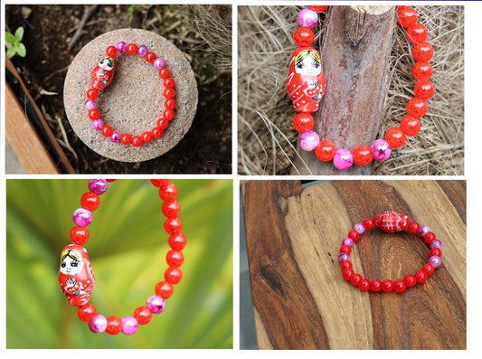 Pieces of beautiful mixed fuchsia/purple glass beads 8 mm. With 8mm Crackle red Glass Beads. And combined with a Nice matryoshka in red color26 x 15 mm