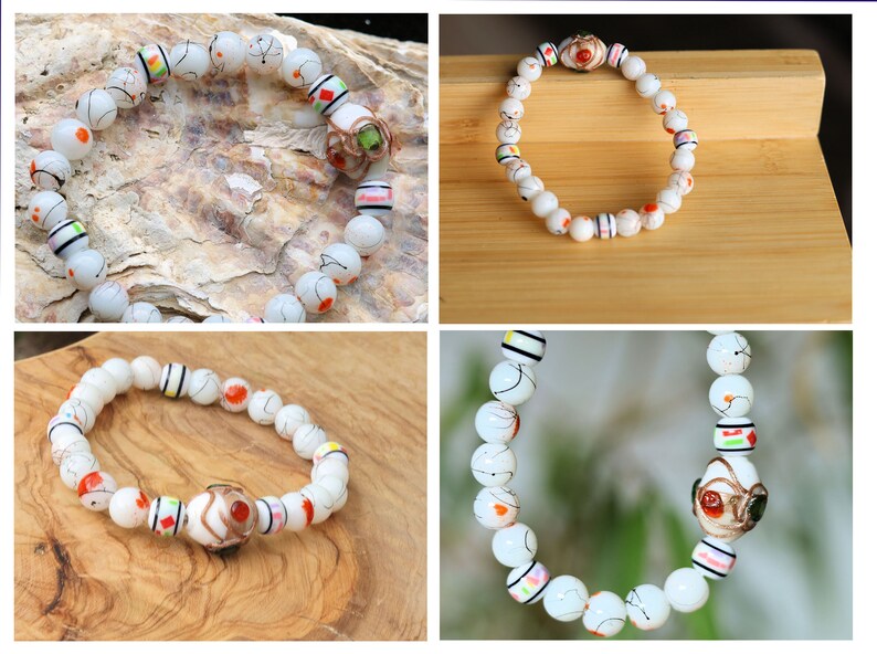 Bead Painted Thread Mandarin 8mm bracelet with beautiful white glass beads with a pattern. Combined with 5 glass spacer beads.  Total weight 17 gr.