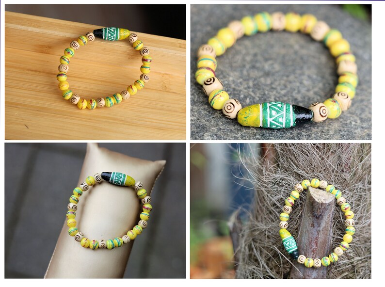 Glass Bead Coated Mix Colors Ø8 mm with very beautiful large handmade clay beads in black, dark blue, white and yellow green of about 30 mm. And Wooden Beads, beige.