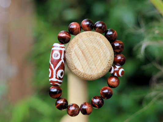 12 mm Red Tiger's Eye beaded bracelet with unique Red/ white big Dzi 6 eyes.  often used in prayer and meditation practices