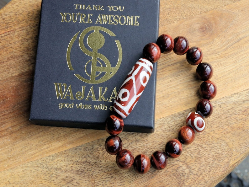 12 mm Red Tiger's Eye beaded bracelet with unique Red/ white big Dzi 6 eyes.  often used in prayer and meditation practices
