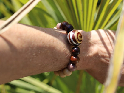 Wooden Spiral bead combined with maple and hornbeam wood. Cultural or Spiritual Significance. a form of self-expression
