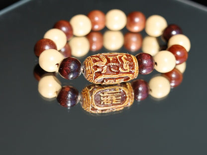 Wooden Spiral bead combined with maple and hornbeam wood. Cultural or Spiritual Significance. a form of self-expression