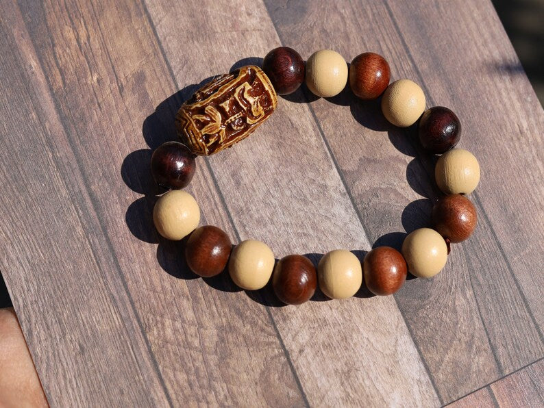 Wooden Spiral bead combined with maple and hornbeam wood. Cultural or Spiritual Significance. a form of self-expression