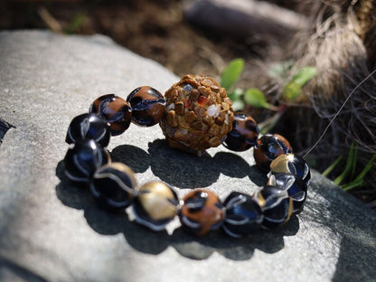 Chunk bead light brown stone covered with different light brown colored stones. Combined with Mixed colors Leather Beads.