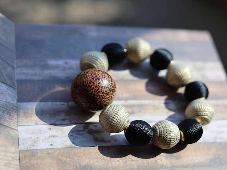 Unique big Palmwood ball warm brown/ grey, 29 mm with Fashionable Stone beads. Material: Stone. Size approx 18mm.