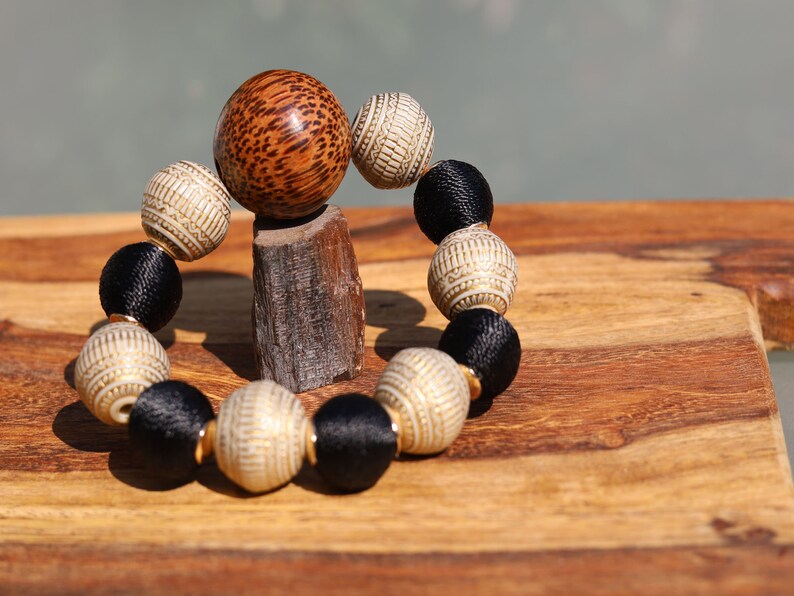 Unique big Palmwood ball warm brown/ grey, 29 mm with Fashionable Stone beads. Material: Stone. Size approx 18mm.