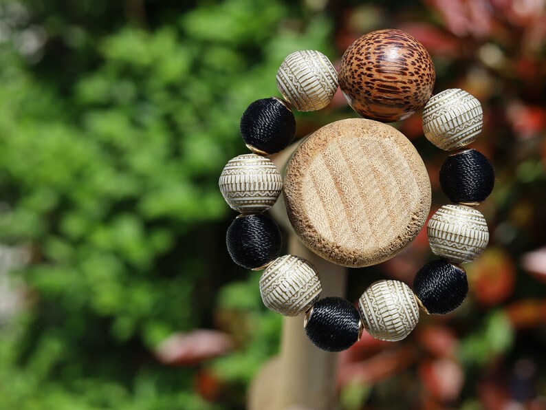 Unique big Palmwood ball warm brown/ grey, 29 mm with Fashionable Stone beads. Material: Stone. Size approx 18mm.