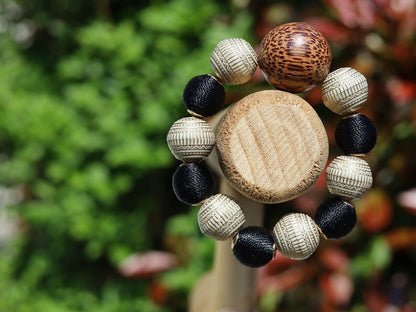Unique big Palmwood ball warm brown/ grey, 29 mm with Fashionable Stone beads. Material: Stone. Size approx 18mm.