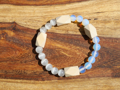 White Line Collection: Wooden Schima beads with facets with Opalite and Cats eye beads.  release emotional blockages
