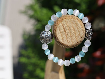 White Line Collection: Blue and white Cat's Eye Selenite bracelet with Tibetan Style Alloy Beads and a Pixiu