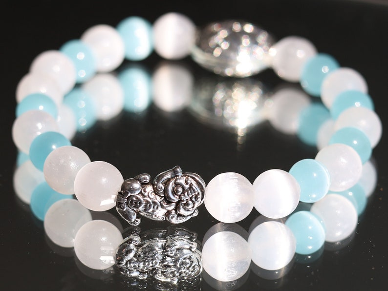 White Line Collection: Blue and white Cat's Eye Selenite bracelet with Tibetan Style Alloy Beads and a Pixiu