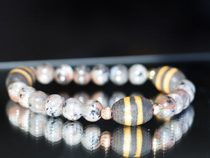 Flame Stone Beads Yooperlite Round. Yooperlite semi-Precious Stone Pearls combined with decorative beads. allows you to speak your truth.