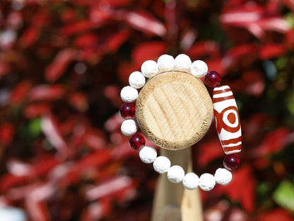Energy Tibetan Red Agate 3 Eye Big Wisdom bracelet with  white lava beads  and 4x Red Agate beads. Surrounded by myth and mystery