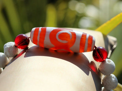 Energy Tibetan Red Agate 3 Eye Big Wisdom bracelet with  white lava beads  and 4x Red Agate beads. Surrounded by myth and mystery